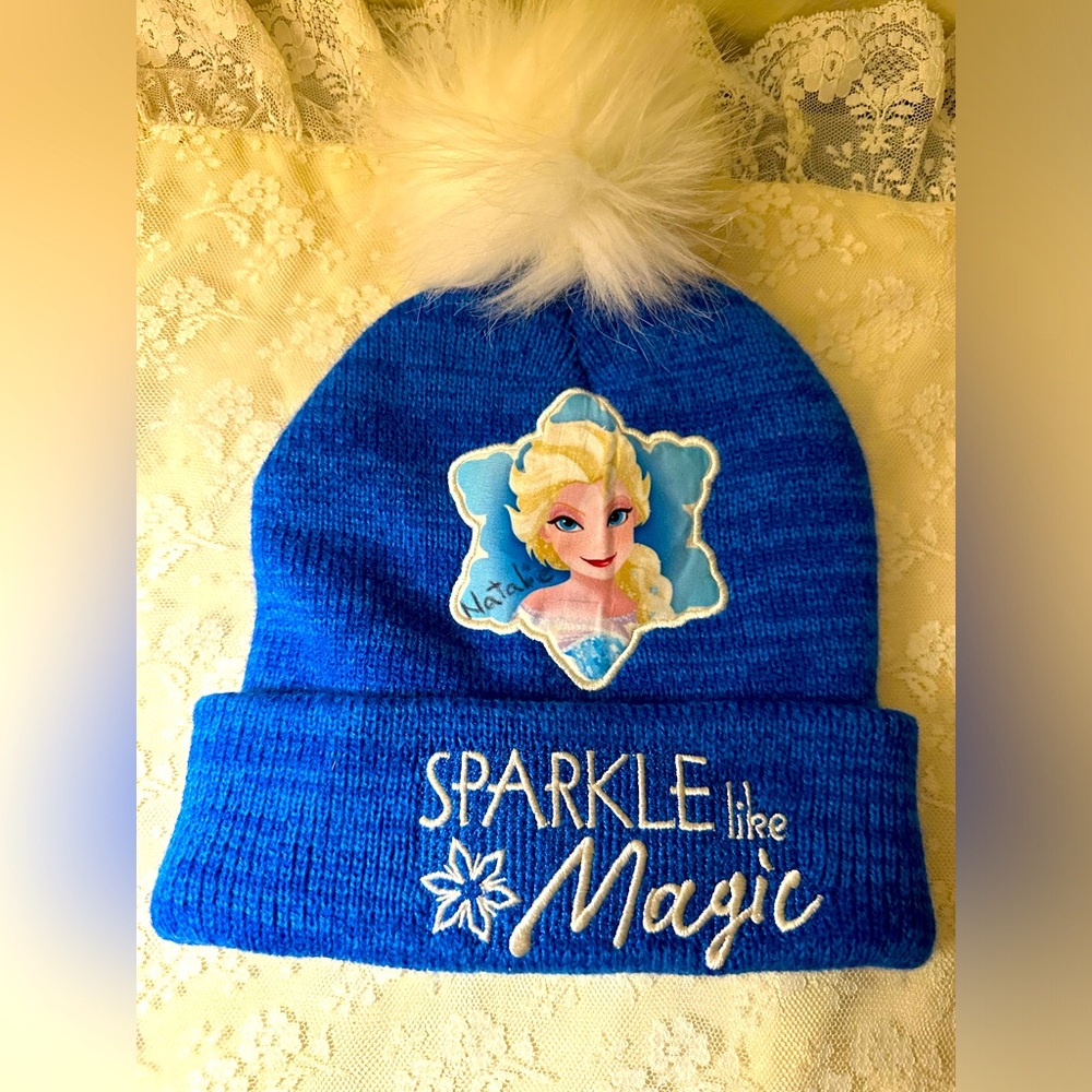Disney Frozen Blue Beanie with White Pom Pom - Natalie written on it